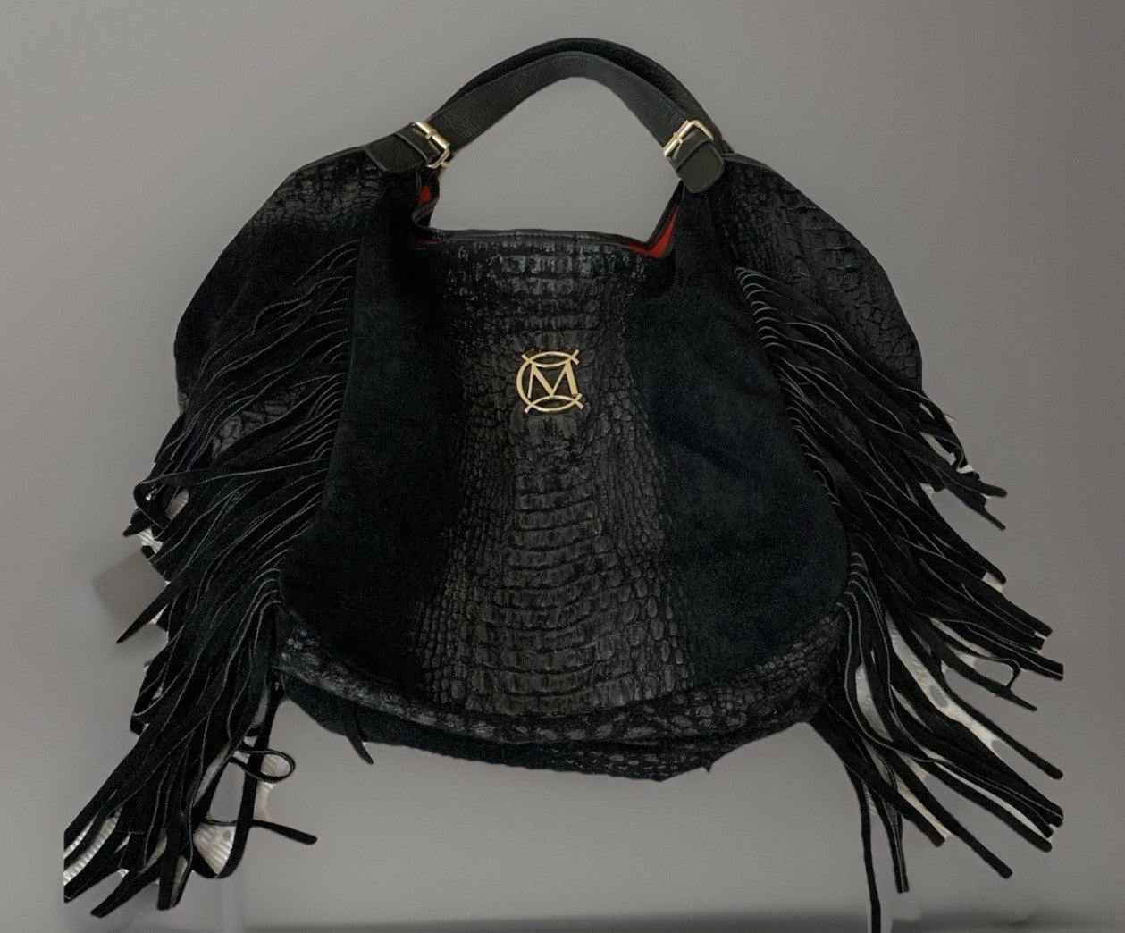 Schwarze Massimo Conti Hobo-Bag mit Kroko-Design und Fransen, liegend